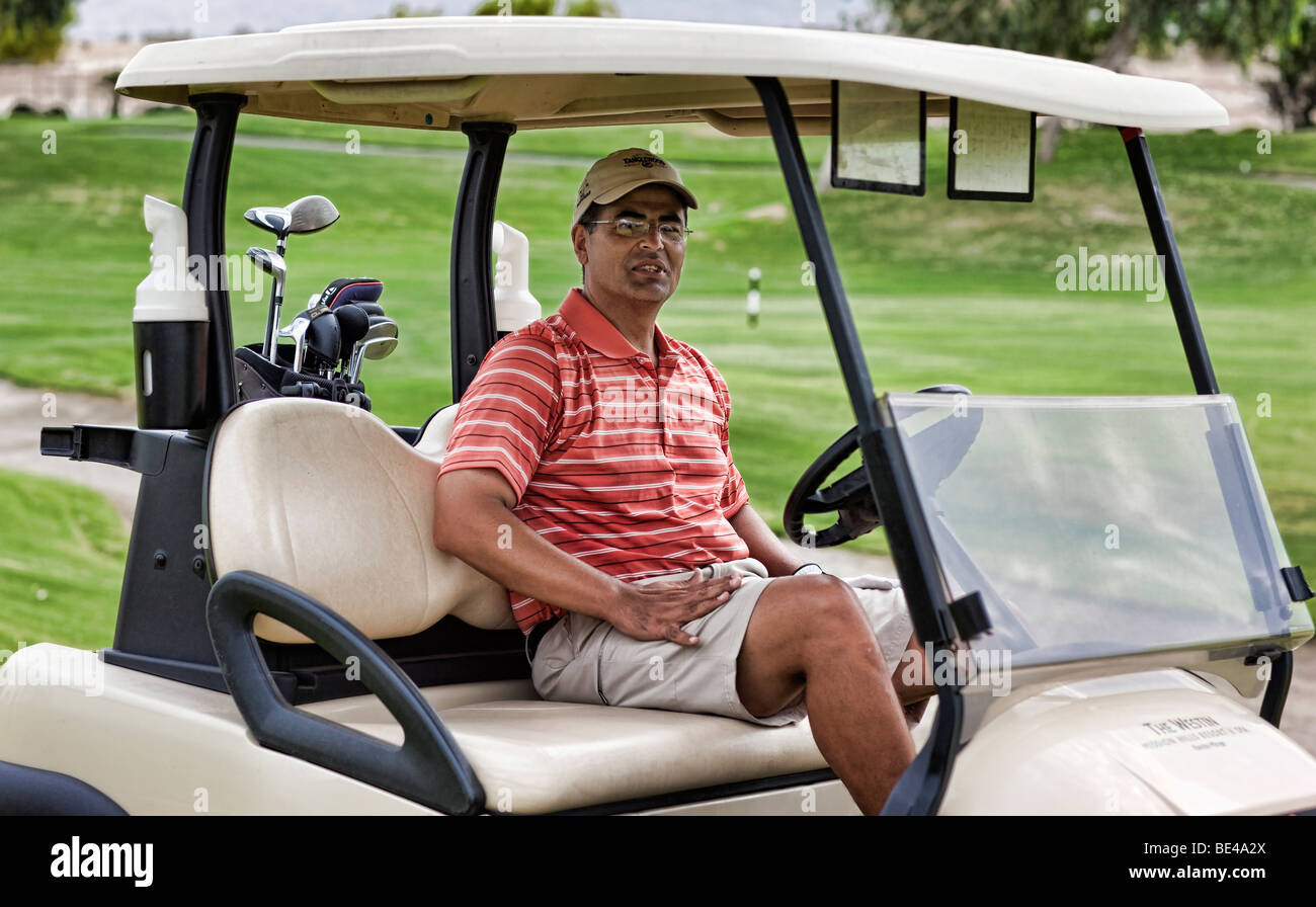 Golfer in Golf Cart Stock Photo Alamy