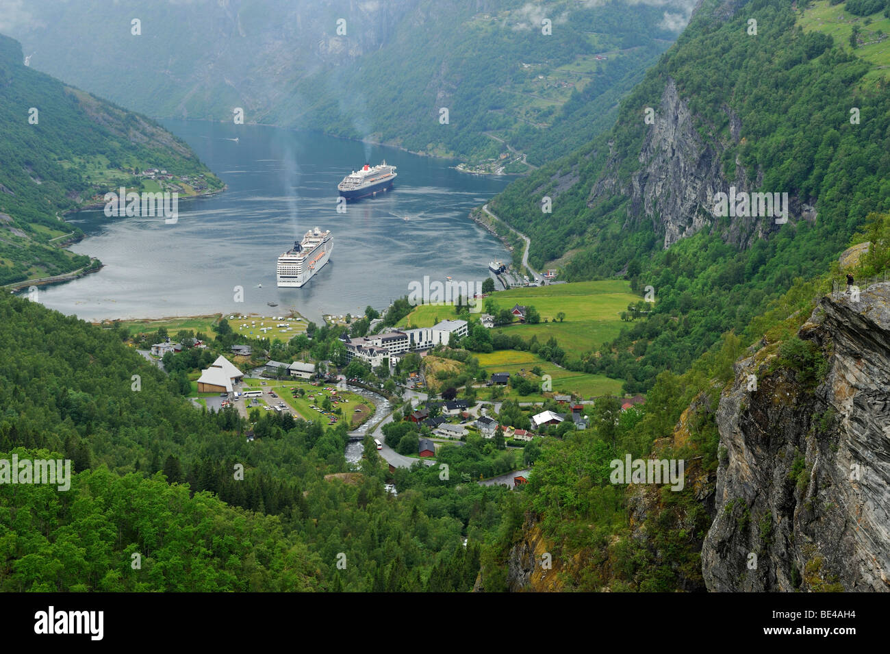 View of the village of Geiranger with cruise ships on the Geirangerfjord, Norway, Scandinavia, Europe Stock Photo