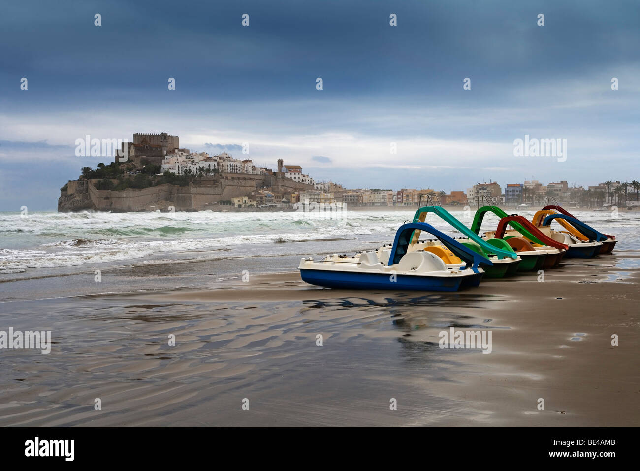 Stormy atmosphere, paddle boats on the sandy beach of Peniscola, Costa Azahar, Spain, Europe Stock Photo