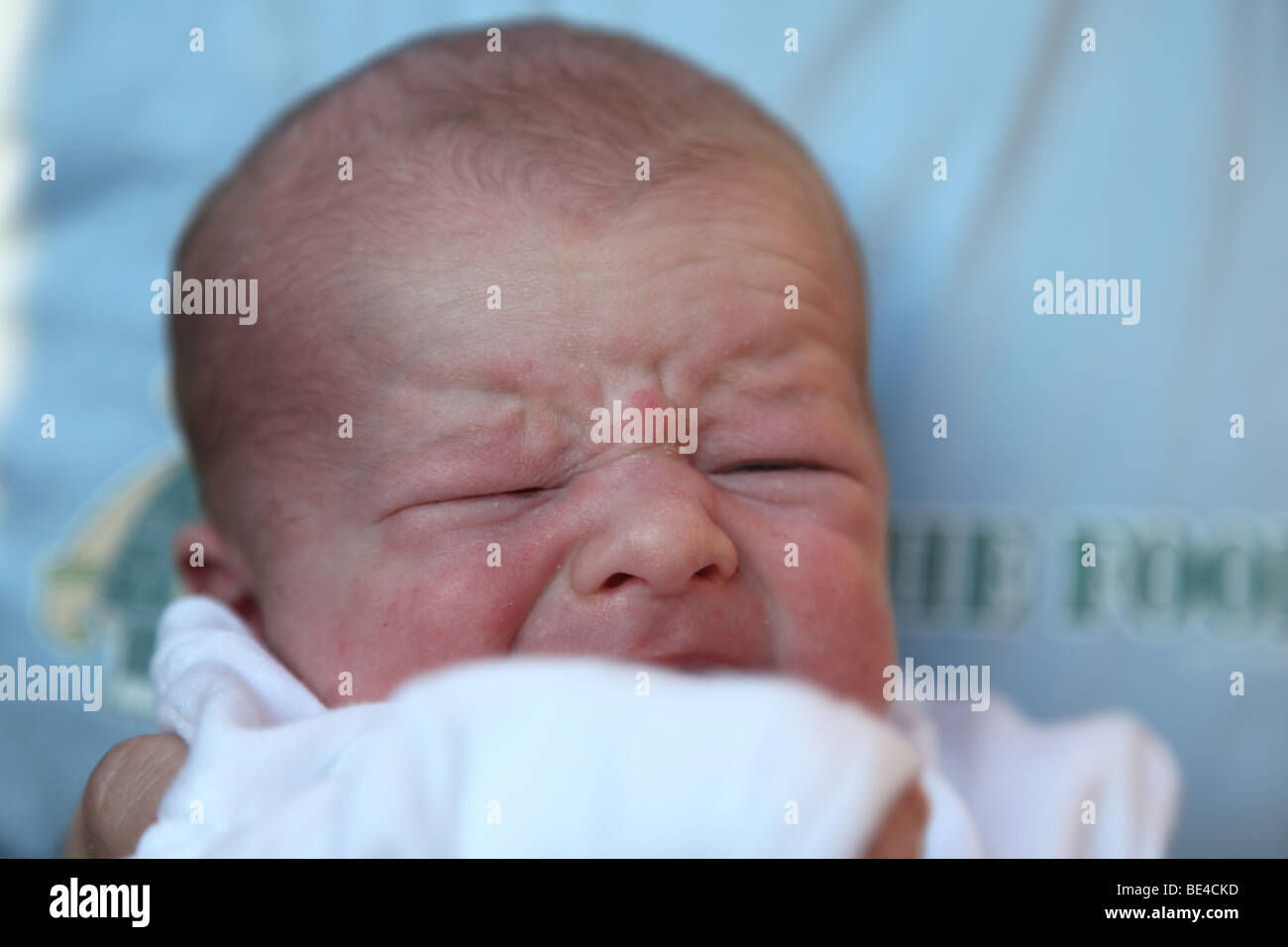 2 week old baby boy crying Stock Photo Alamy