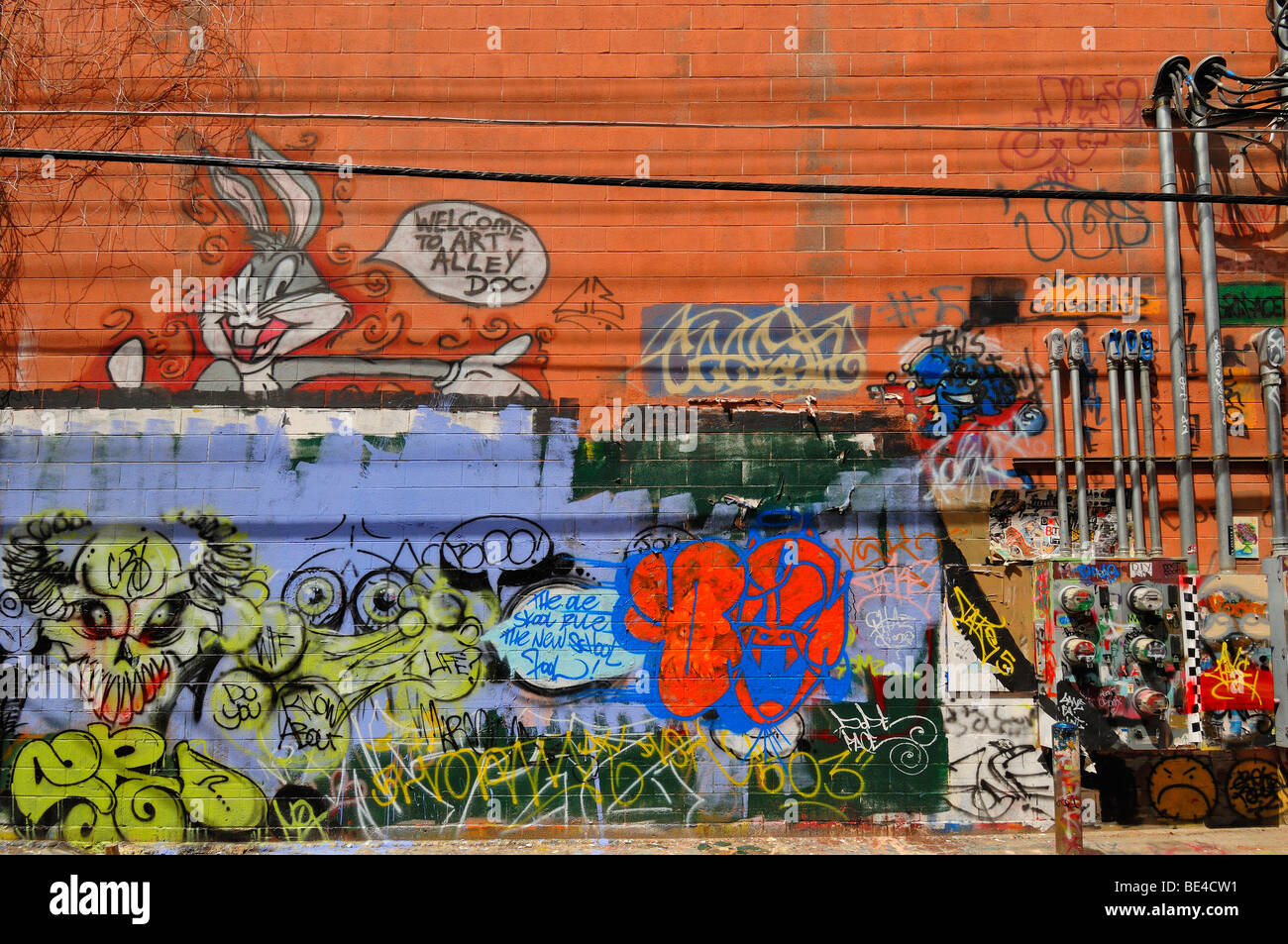 Art Alley is an ugly street in an attractive town. To overcome this problem the city authorities encouraged graffiti artists . Stock Photo