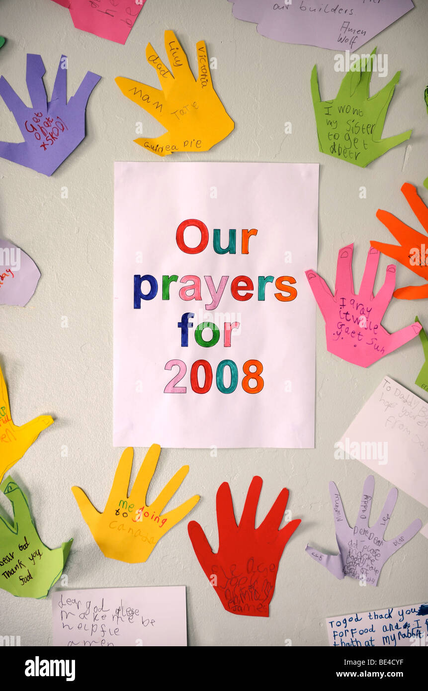 CHILDRENS PRAYERS WRITTEN ON CUT OUT HANDS AT A SUNDAY SCHOOL UK Stock Photo
