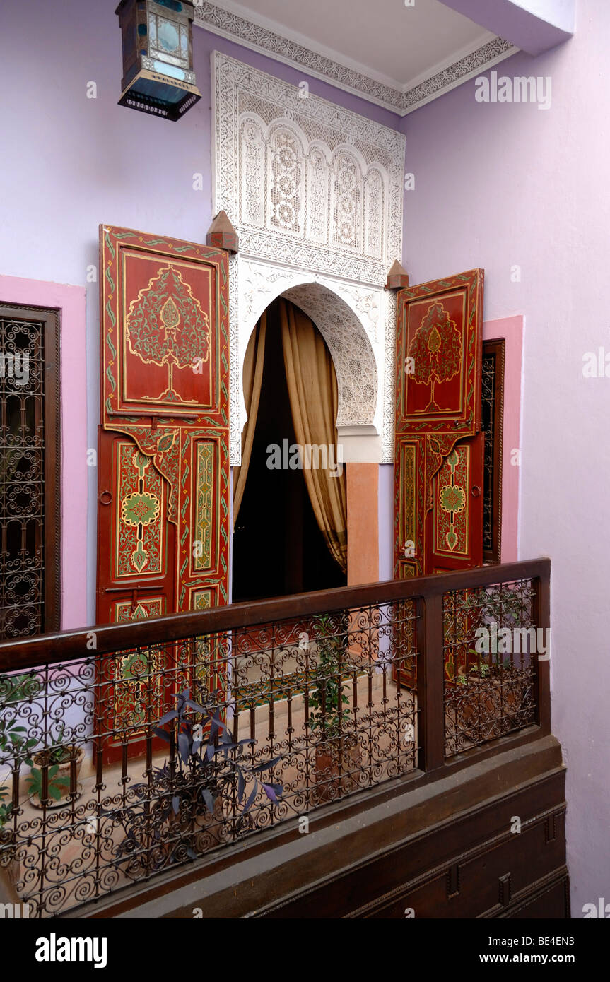 Painted Bedroom Doors or Entrance and Landing or Balcony, Interior of the Riad Mandar Zen House, Marrakesh, Morocco Stock Photo