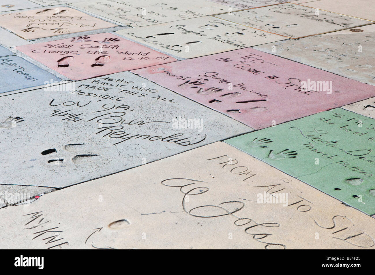 Concrete blocks with celebrity handprints and signatures outside Grauman's Chinese Theatre in Hollywood, LA Stock Photo
