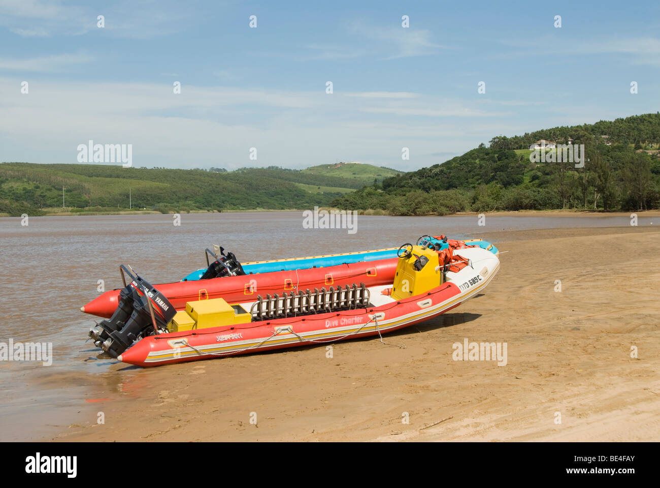 Dive charter boats on the bank of the Umkomaas river on the South Coast of Kwazulu Natal in South Africa Stock Photo