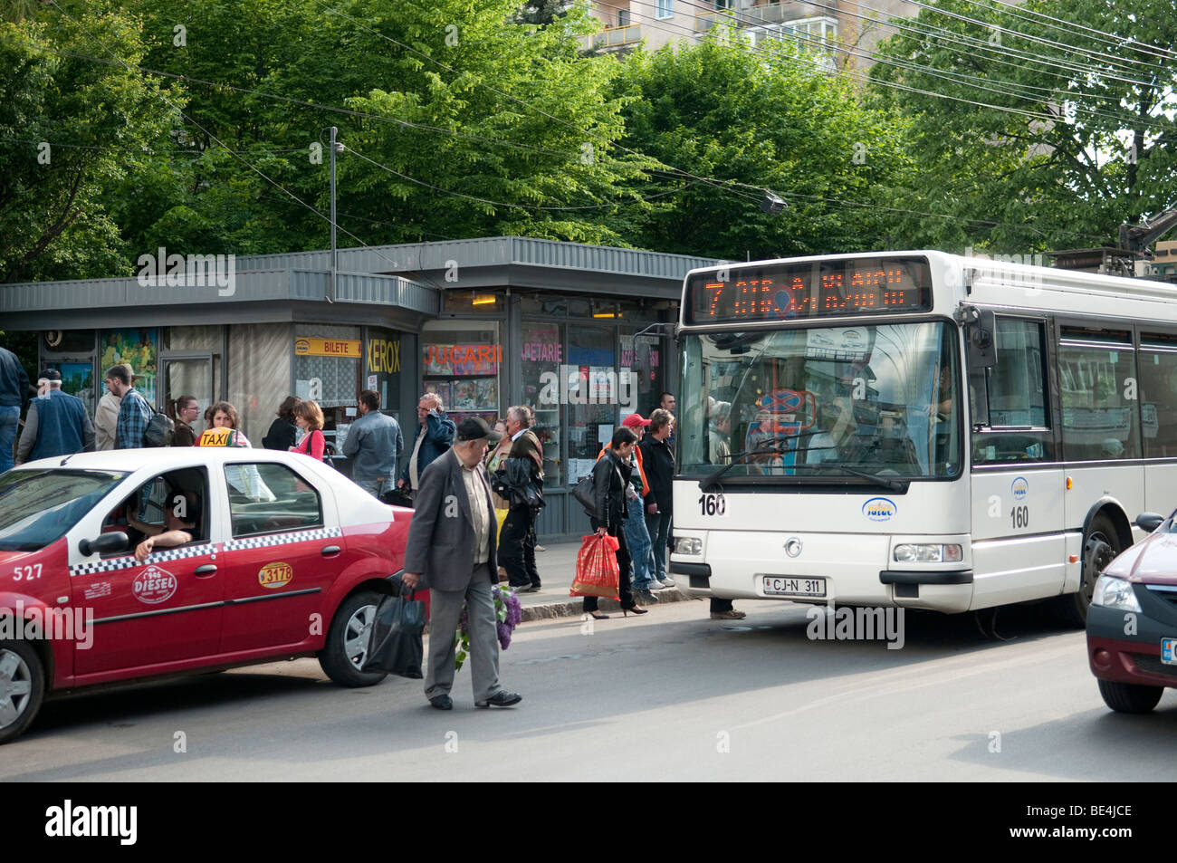 Bus And Taxi At Stop In Cluj Napoca Romania Eastern Europe Stock Photo Alamy