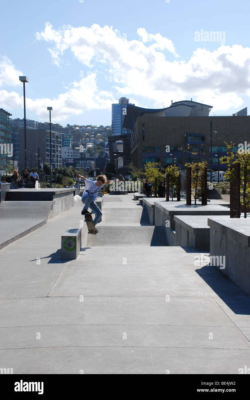 Skateboarder in Wellingtons skate park on the Waterfront, with Te Papa