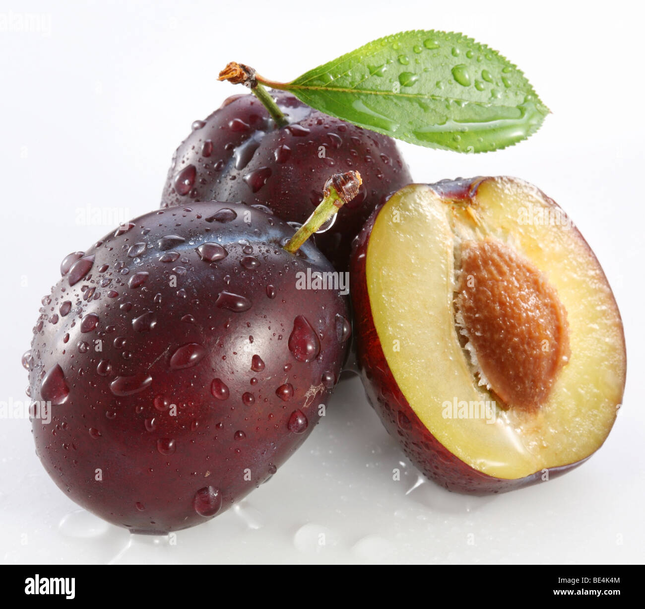 Plums on a white background Stock Photo