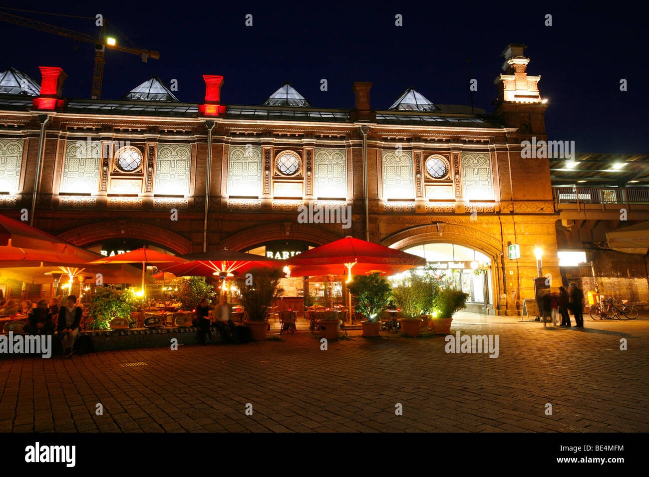 S-Bahnhof Hackescher Markt station with restaurants with outdoor seating at night, Mitte, Berlin, Germany, Europe Stock Photo