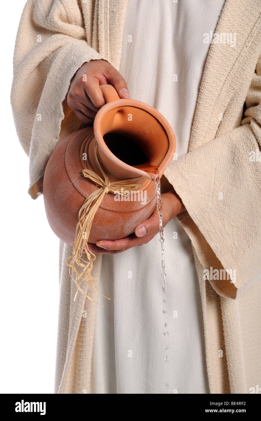 Hands of Jesus pouring water from Jar - Allegory of &ldquo;living water&rdquo; as