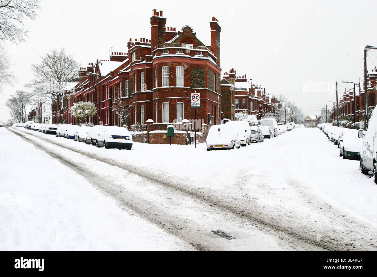 Heavy snow in Victorian London terraced street Stock Photo