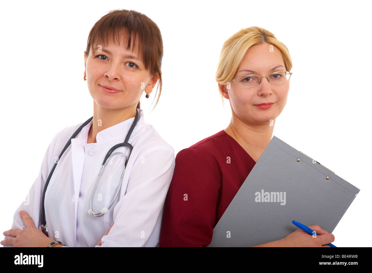 female doctor and nurse in glasses with medical accesories Stock Photo