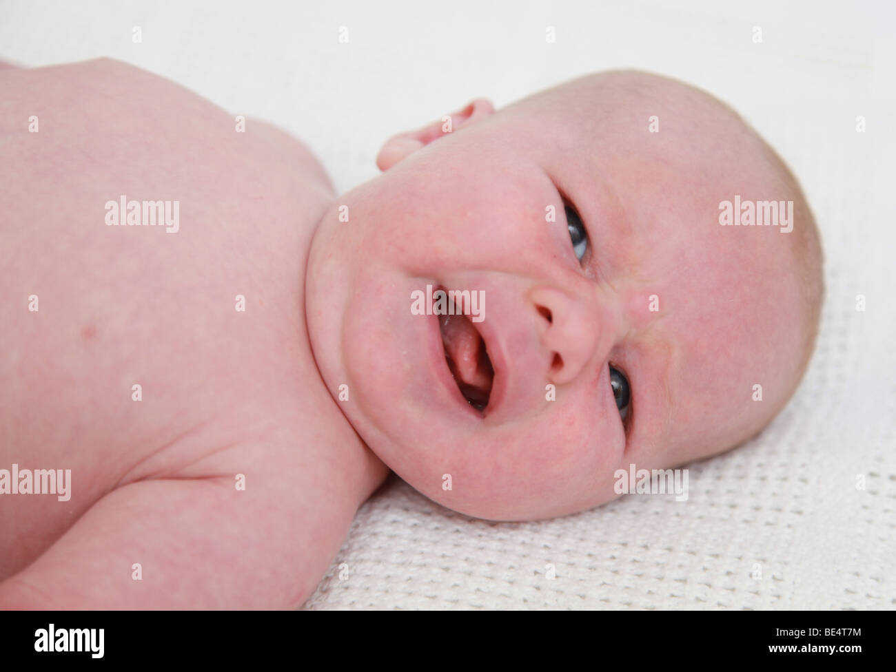 Week old baby boy crying hi-res stock photography and images - Alamy