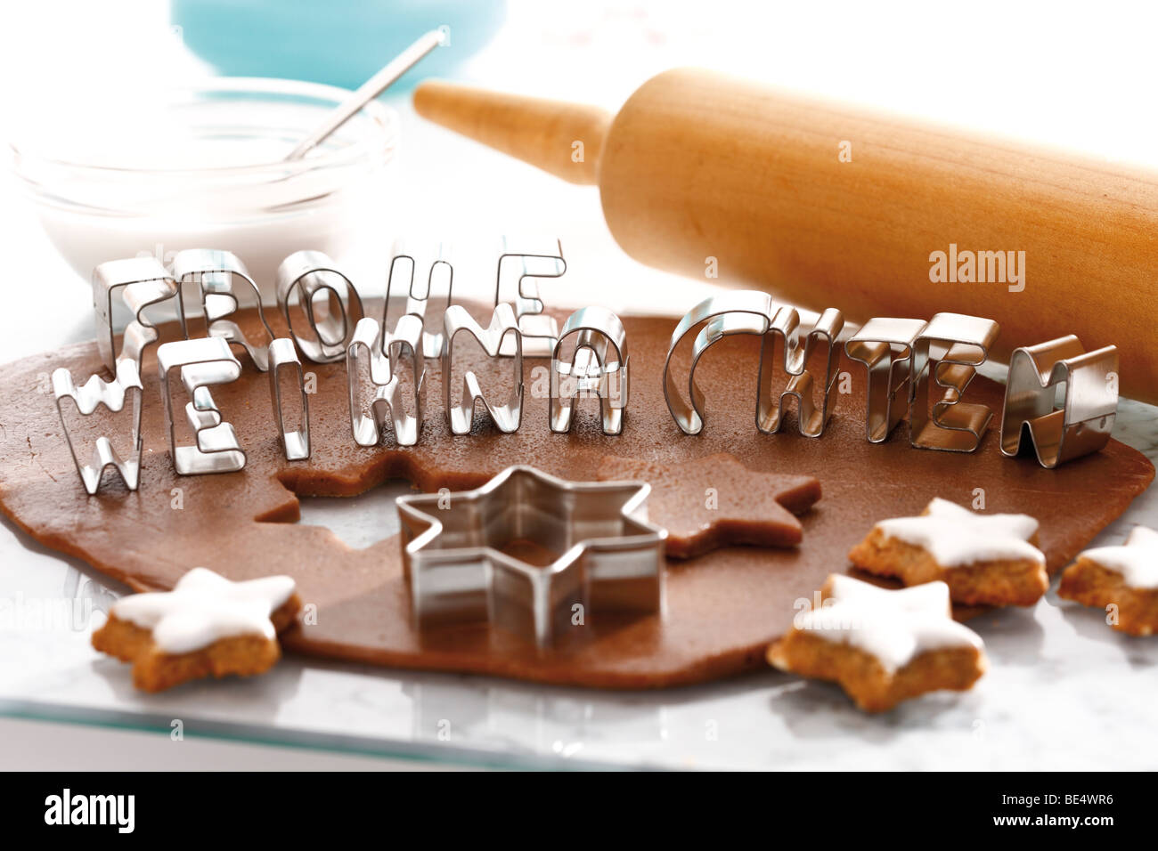Cutting out cinnamon cookies, baking Stock Photo
