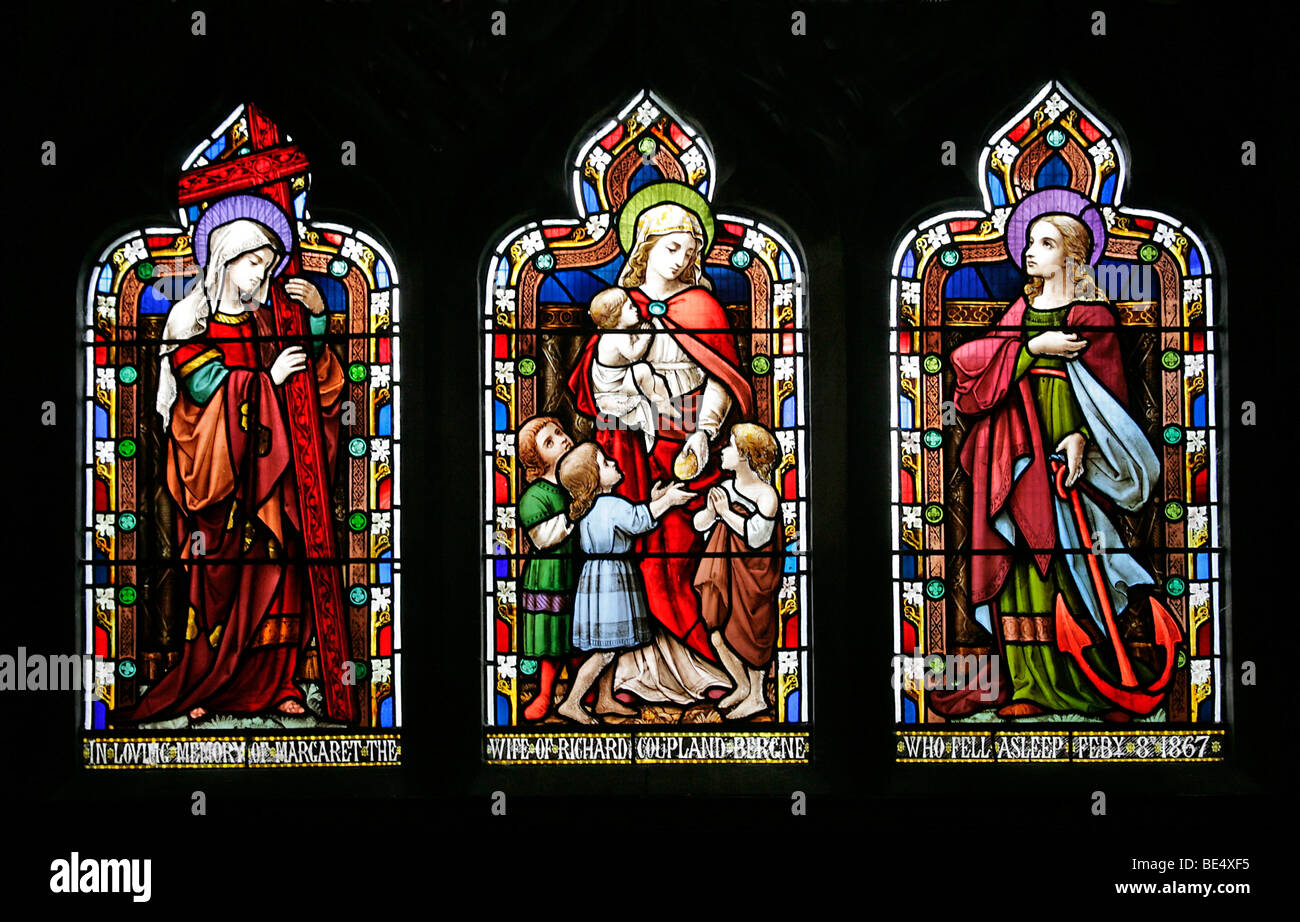 Stained Glass Window Depicting Saints Faith, Hope and Charity, St John the Evangelist Church Washingborough, Lincolnshire Stock Photo