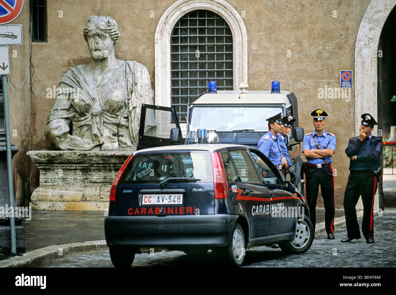Ancient Roman monumental statue, Carabinieri, Palazzo di San Marco, Piazza Venezia, Rome, Lazio, Italy, Europe Stock Photo