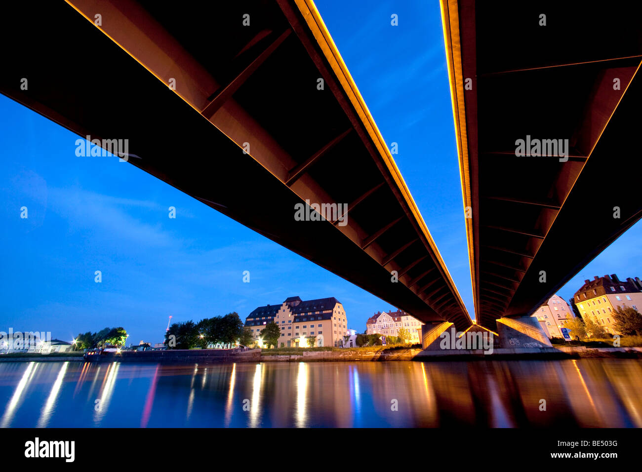 Night shot of the Nibelungenbruecke bridge with the Danube river in Regensburg, Bavaria, Germany, Europe Stock Photo