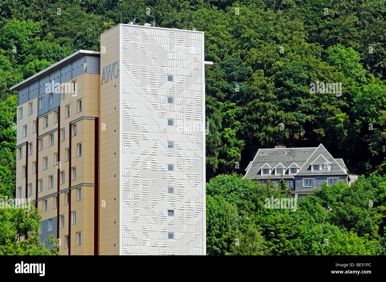 Pre-fabricated concrete building of the GDR, in the back a villa on the Domberg mountain, Suhl, Thuringia, Germany, Europe Stock Photo