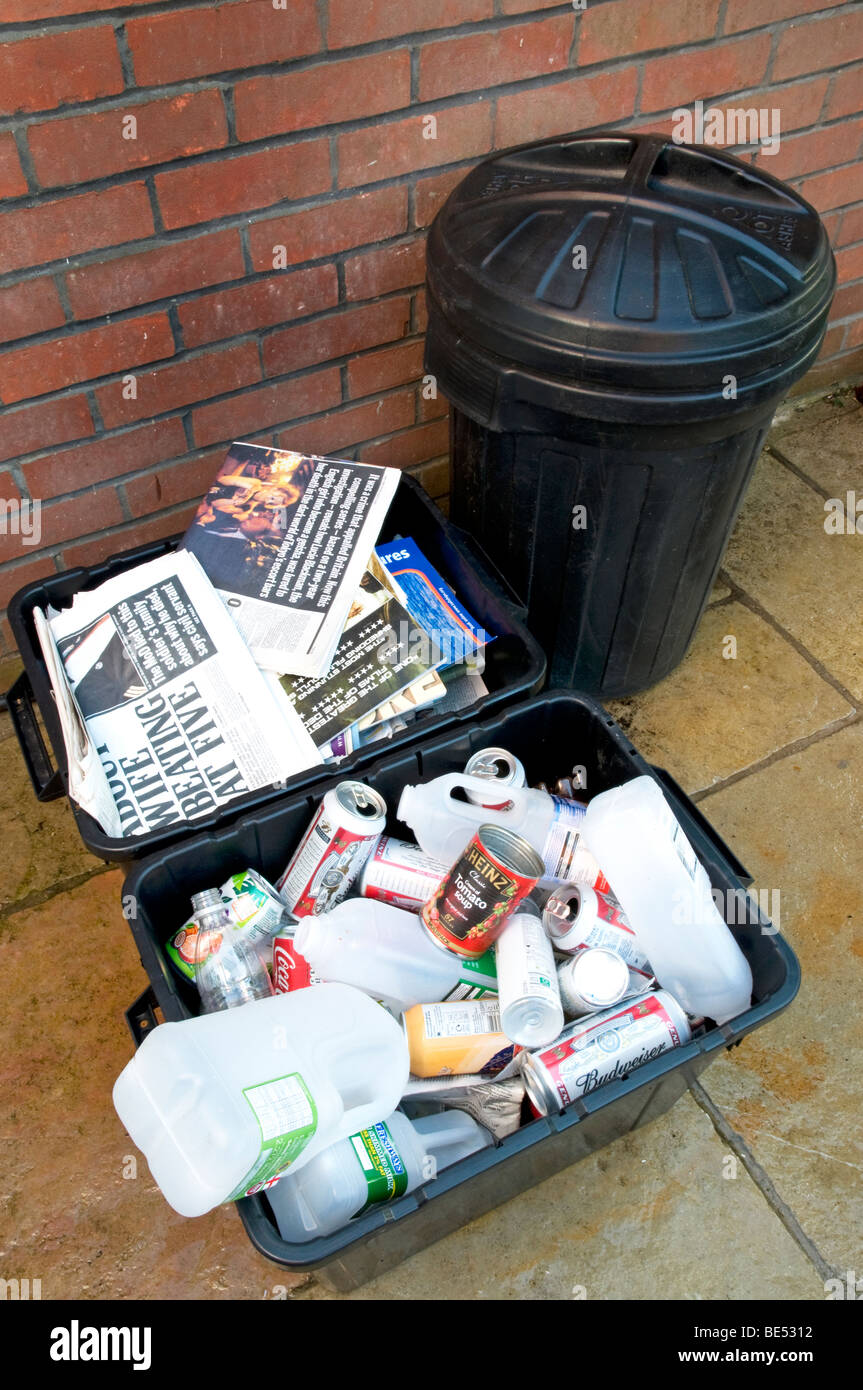 Domestic rubbish collection,  showing separated waste for re -cycling , Paper bin  Plastic Bin  and domestic household rubbish Stock Photo