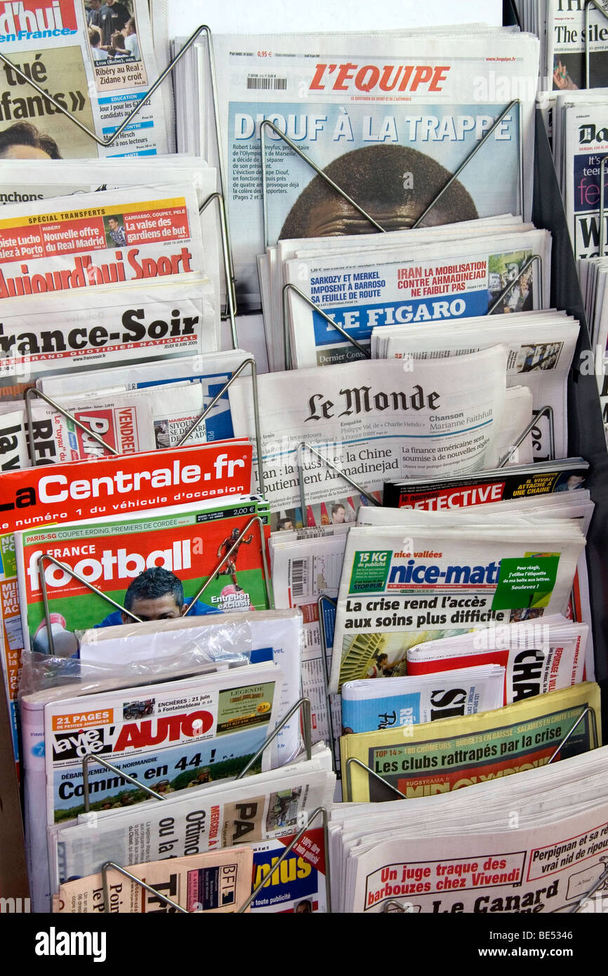 French language newspapers at an airport newsstand in Nice, France. Stock Photo