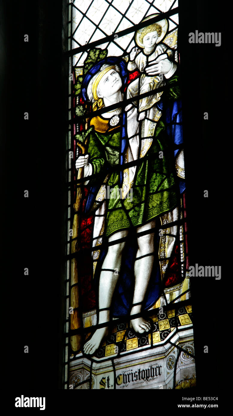Stained Glass Window Depicting St Christopher carrying Jesus across the river, Hough on the Hill, Lincolnshire Stock Photo
