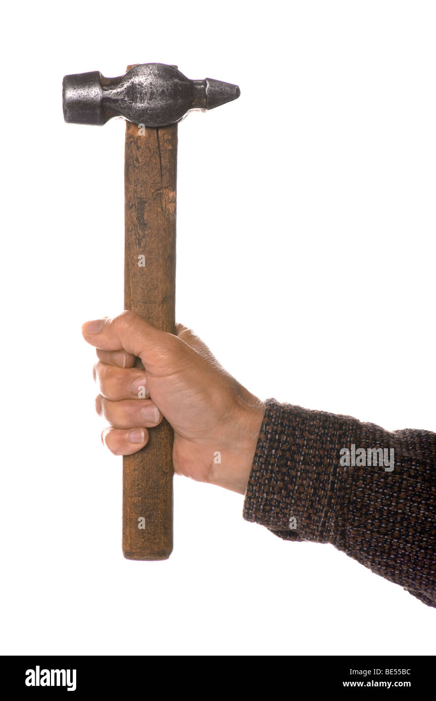 object on white - isolated hammer in hand Stock Photo