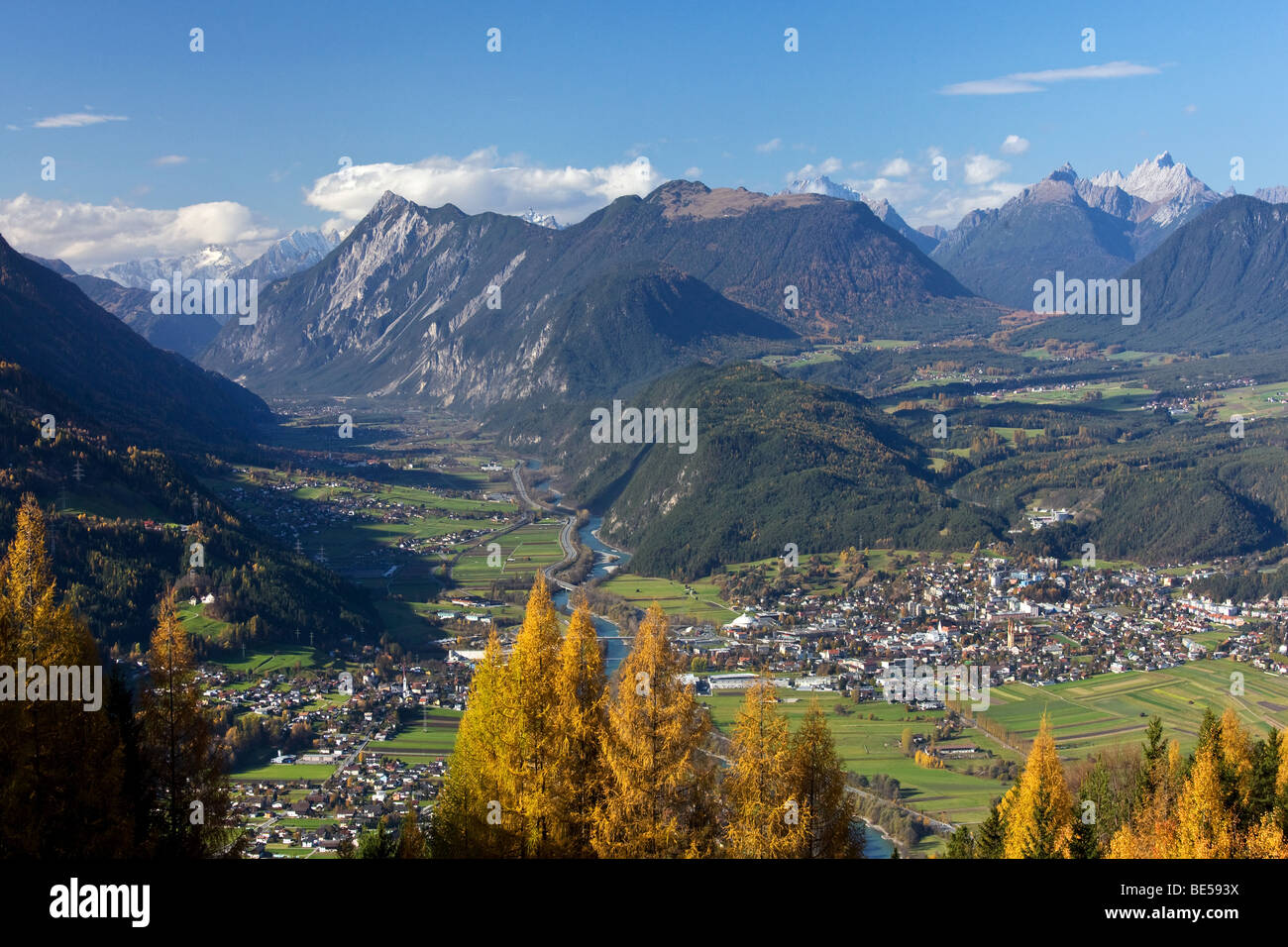 Telfs am Inn, view from Moesern to the Inntal valley, larch trees in autumn, on the right Mieminger Plateau, Oberinntal Upper I Stock Photo