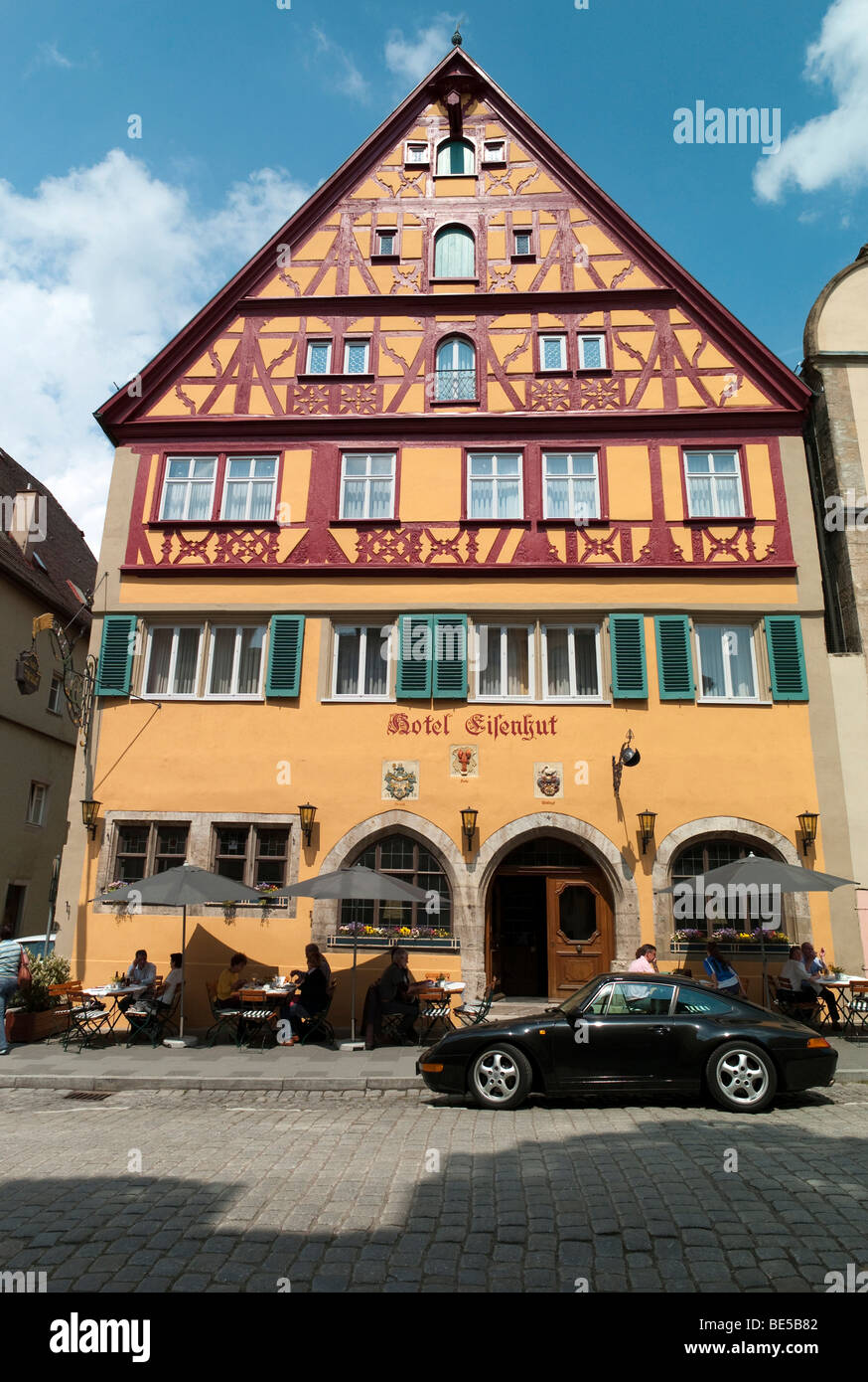 Shops, restaurants, half-timbered houses, Herrngasse street, Rothenburg ob der Tauber, Bavaria, Germany, Europe Stock Photo