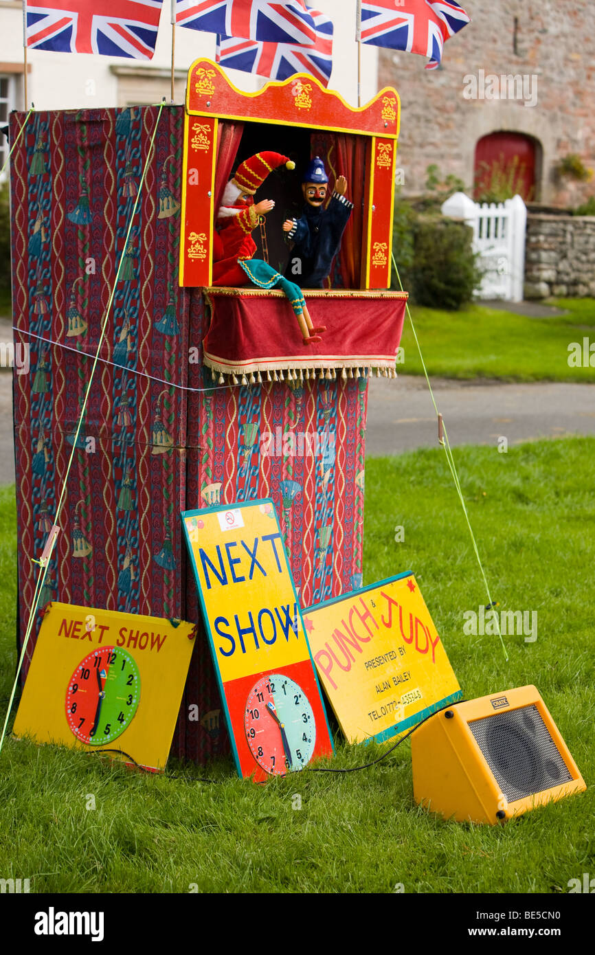 Punch and Judy on the village green Stock Photo Alamy