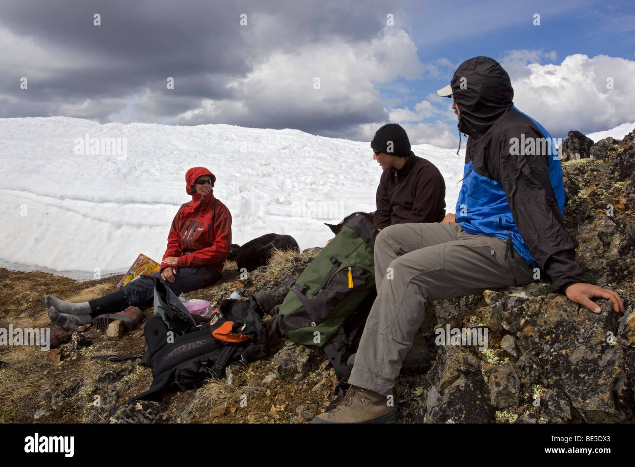 Group of hikers resting, Mt. Lorne, Pacific Coast Ranges behind, Yukon Territory, Canada, North America Stock Photo