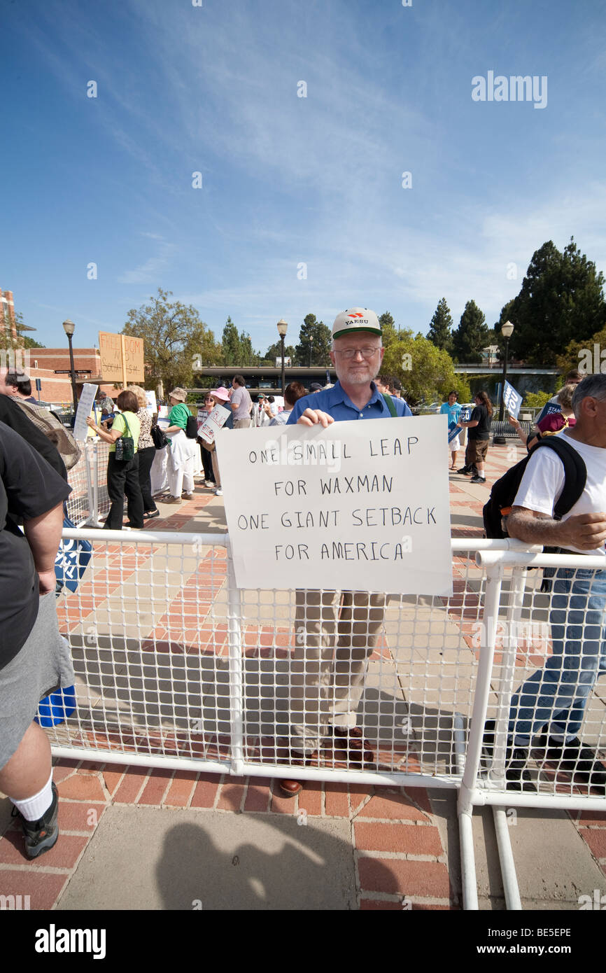 Conservative demonstrator holds up a sign outside a climate change panel with Henry Waxman (D-CA) on August 21, 2009 at UCLA. Stock Photo