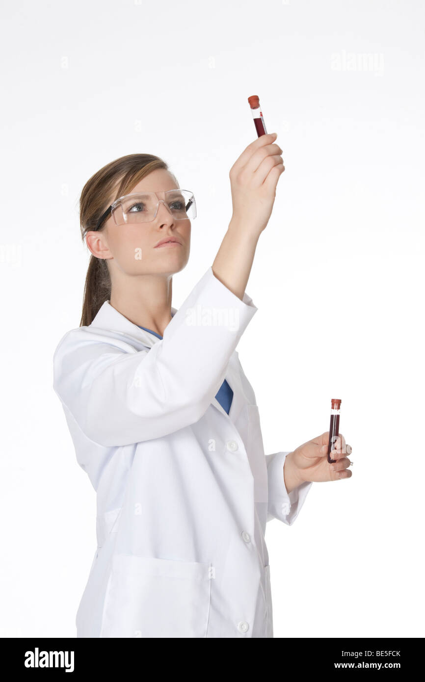 Lab tech holding a blood sample hi-res stock photography and images - Alamy