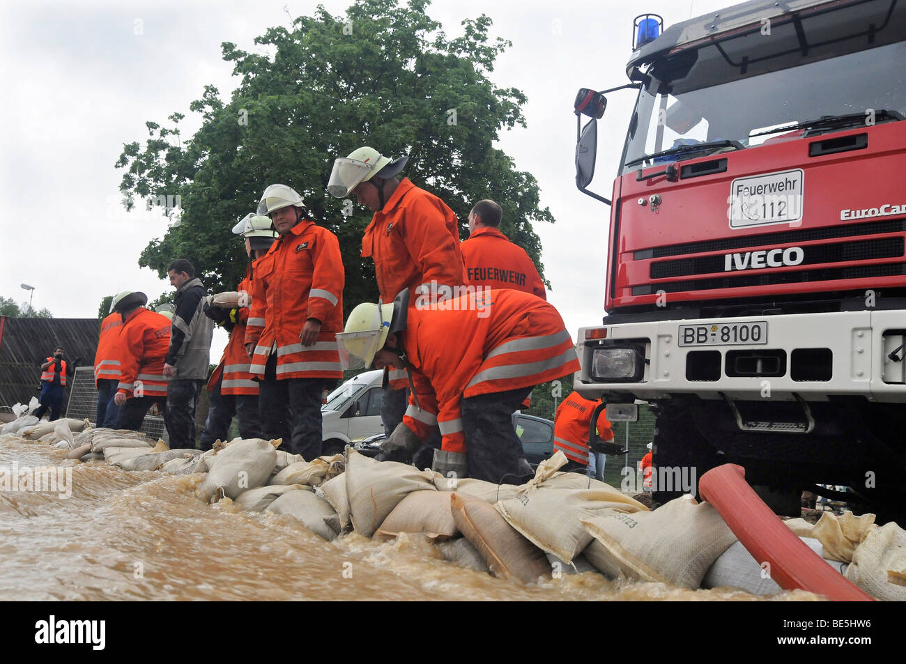Firefighters in action after flooding by heavy rains, Weil der Stadt, Baden-Wuerttemberg, Germany, Europe Stock Photo