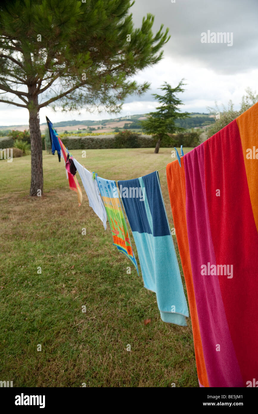Colourful washing hanging on a washing line Stock Photo