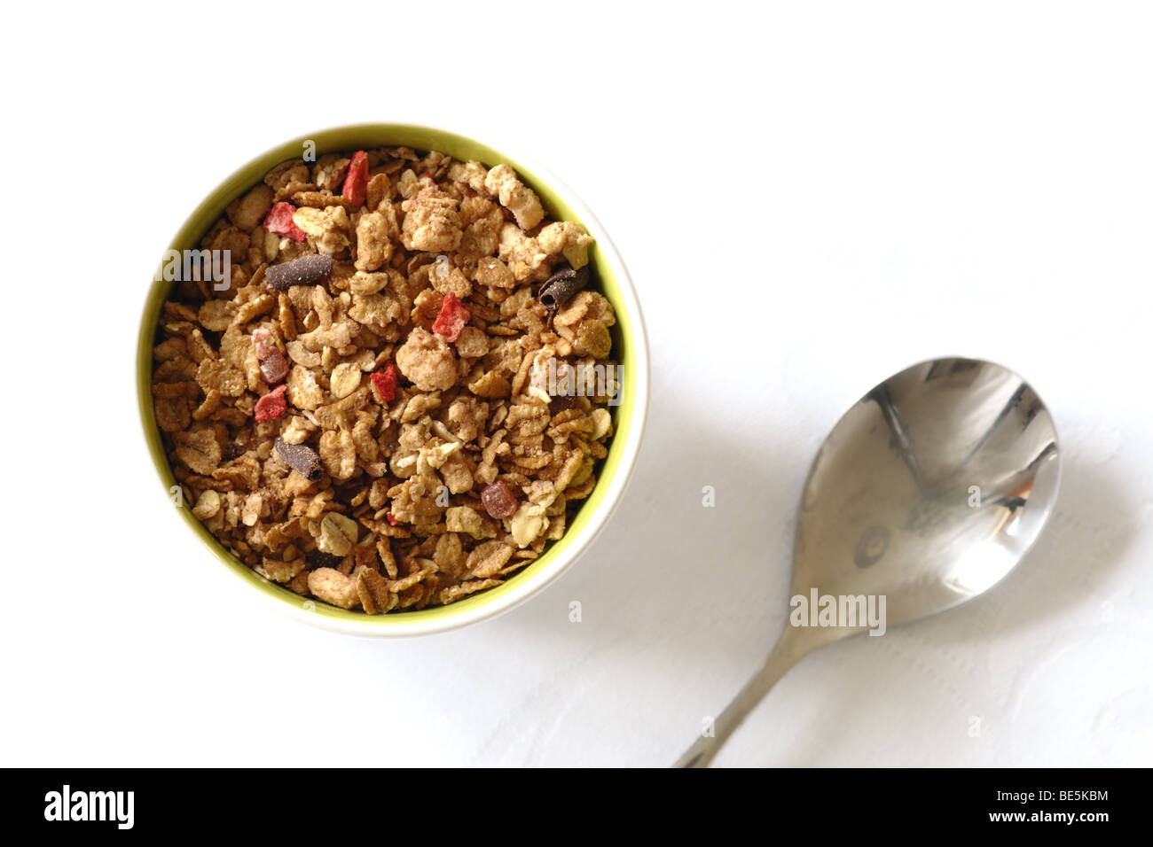 Musli in a cup with spoon Stock Photo - Alamy