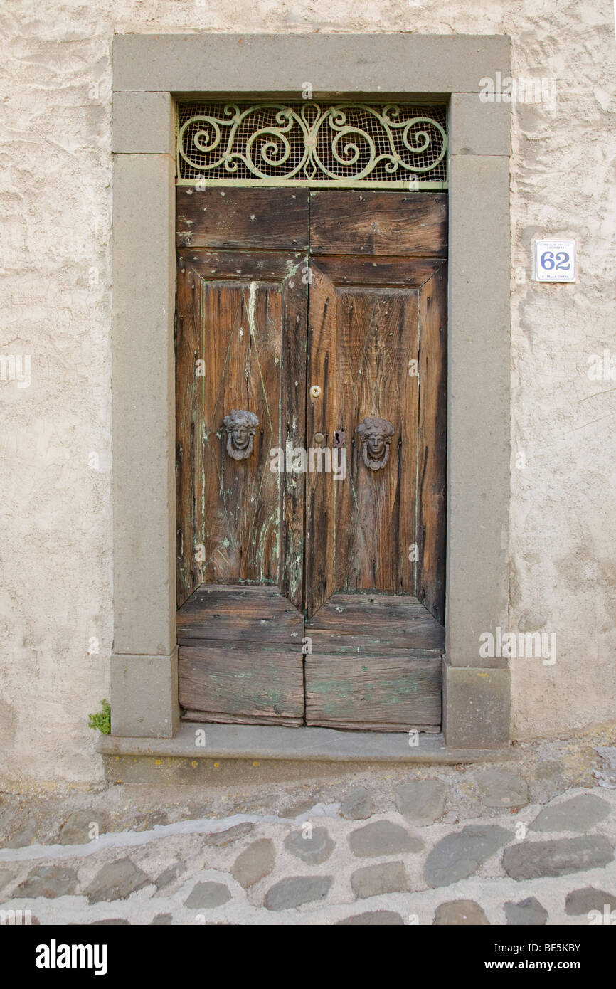 Old doorway in Italy Stock Photo