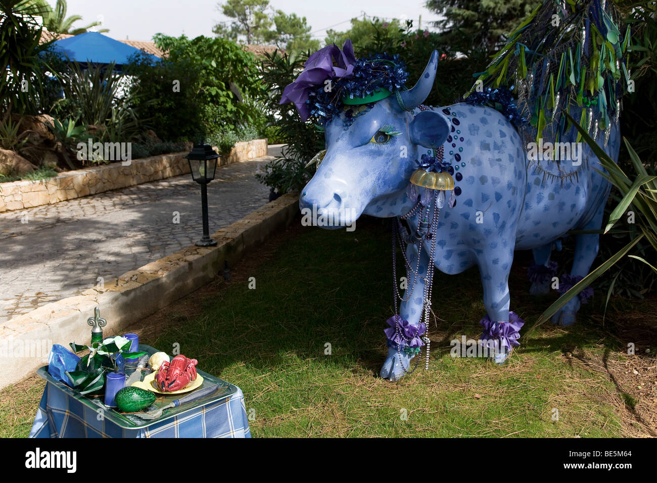 Blue cow sculpture in front of the restaurant São Gabriel, Almansil, Algarve, Portugal, Europe Stock Photo