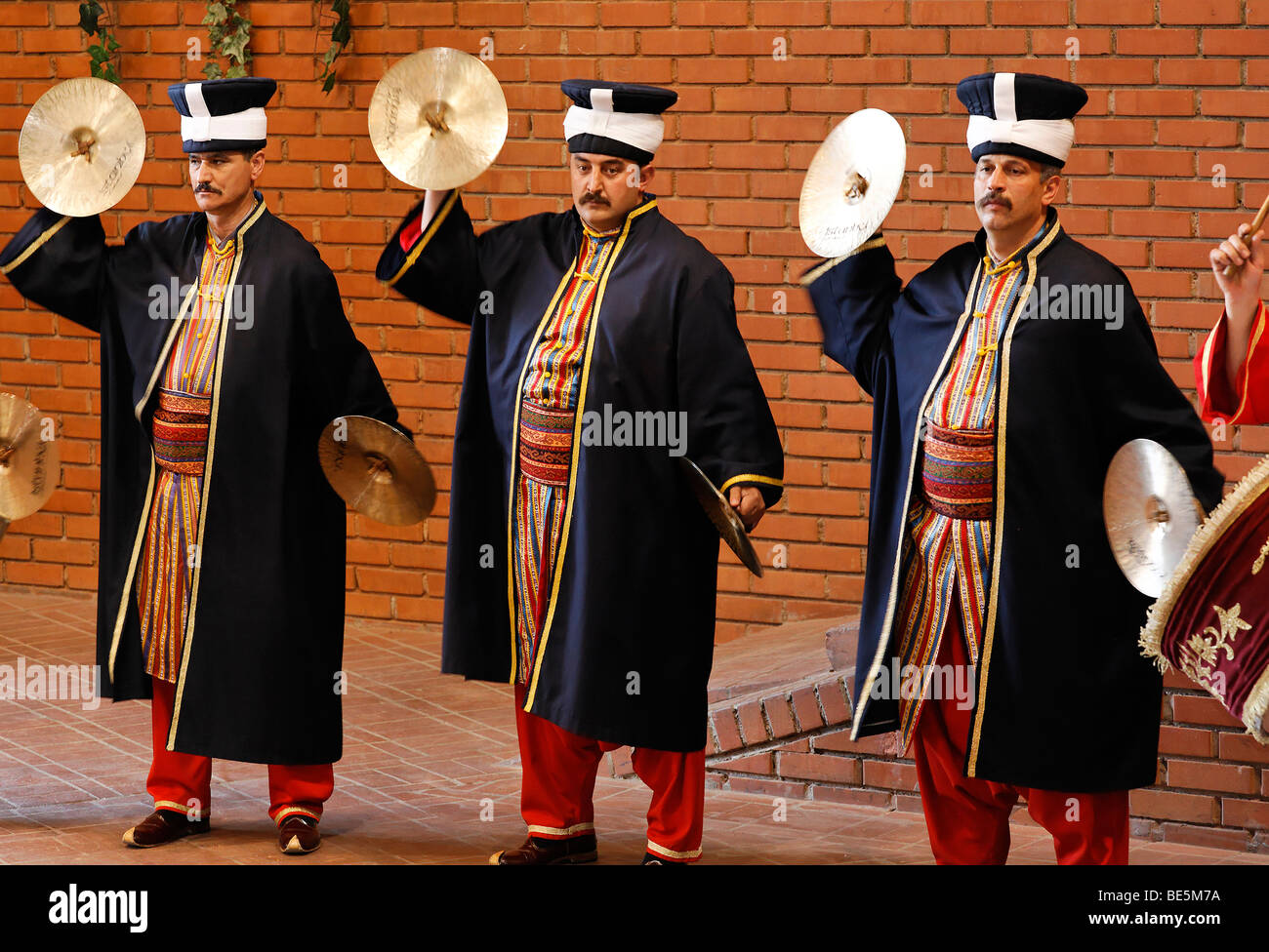Costumed musicians playing cymbals, historic chapel Janitscharen Military, Mehter Chapel, demonstration in the military museum, Stock Photo