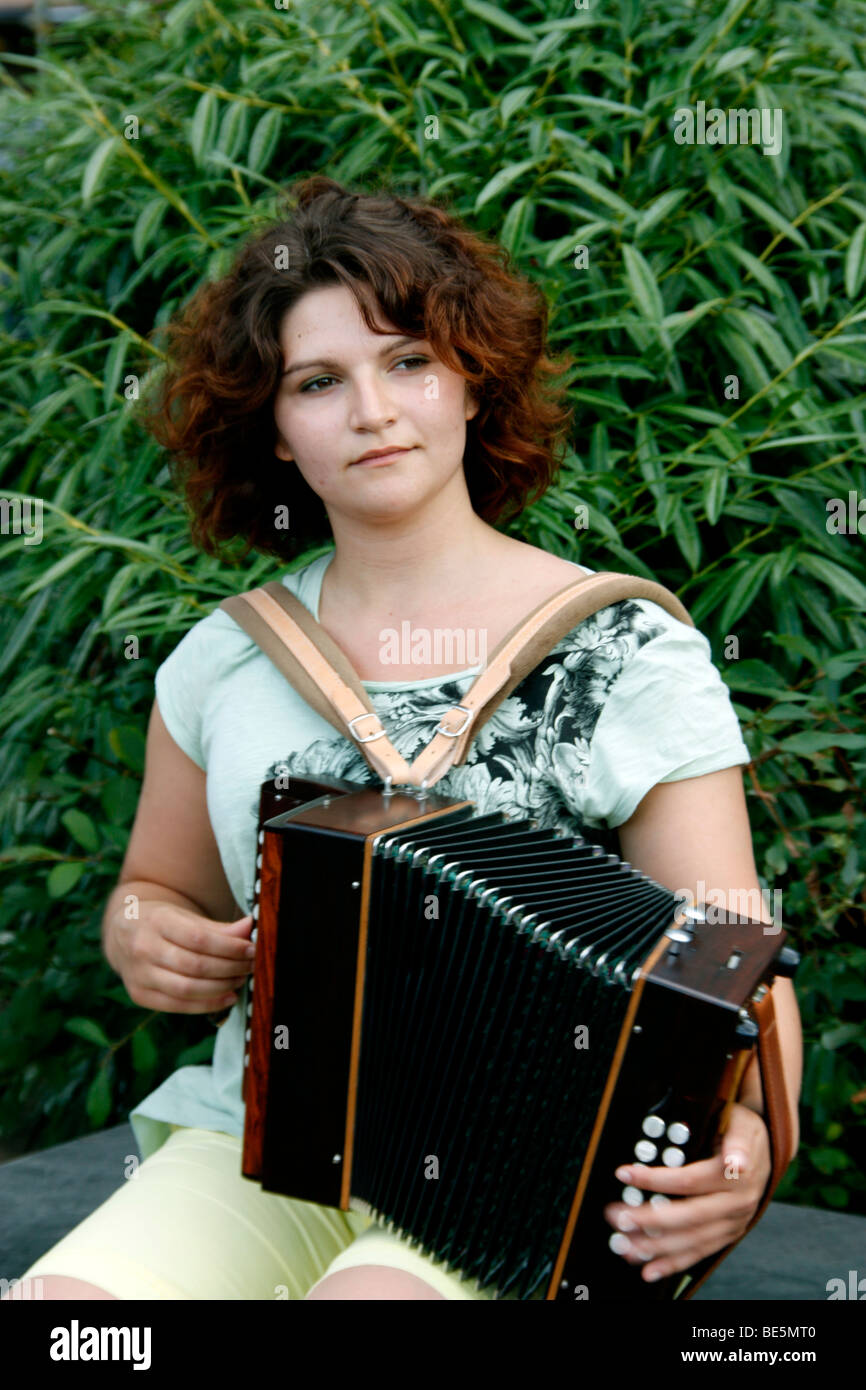 accordionist woman Stock Photo