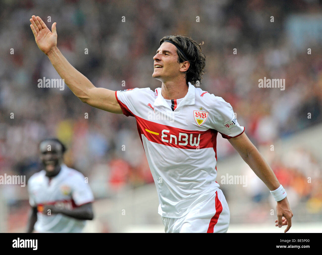 Mario Gomez, VfB Stuttgart, celebrating a goal, Arthur BOKA in the back, VfB Stuttgart Stock Photo