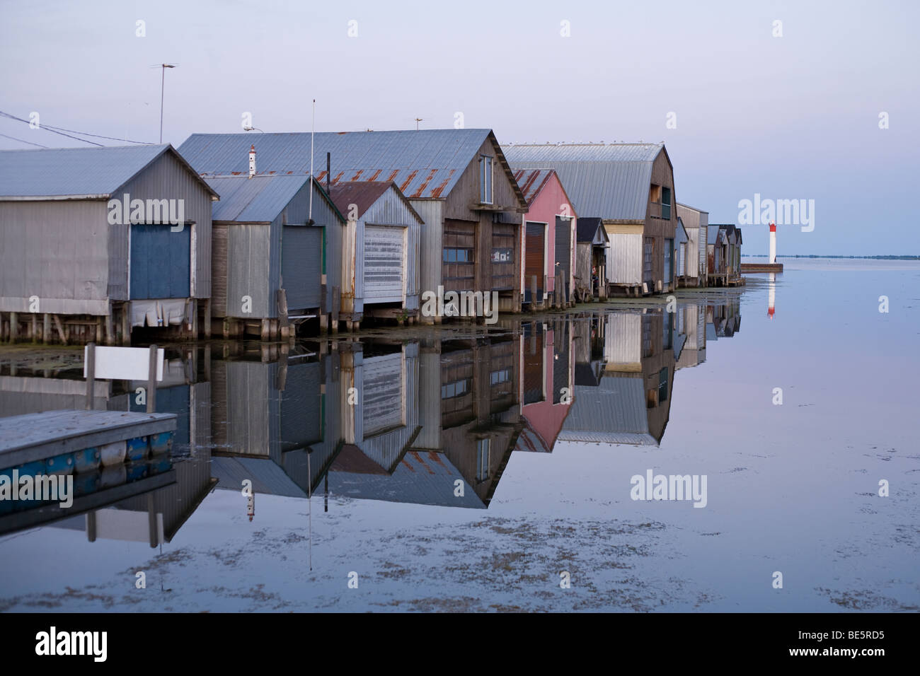 Port Rowan Boat Houses. A row of old boathouses lead out to the small
