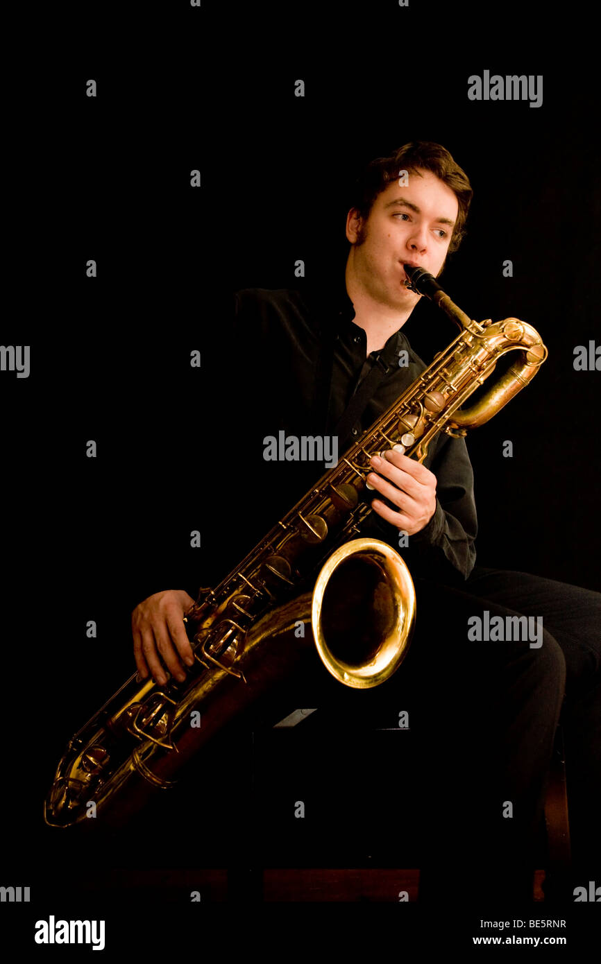 Young musician playing the baritone saxophone Stock Photo