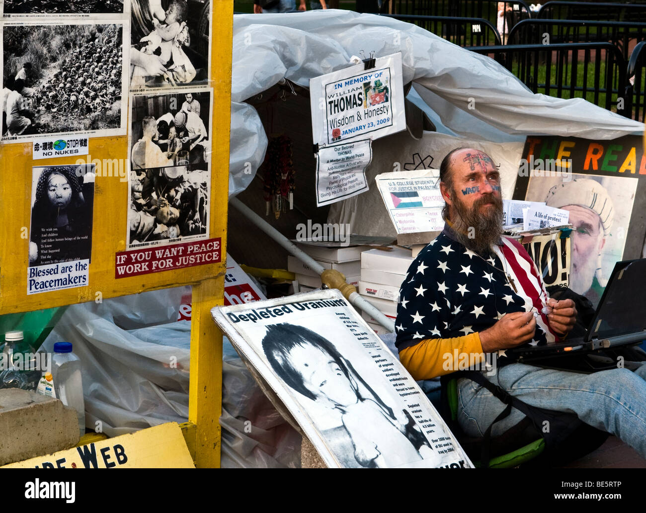 A full time protester with tattooed face in front of the White House, Lafayette Park, Washington DC Stock Photo