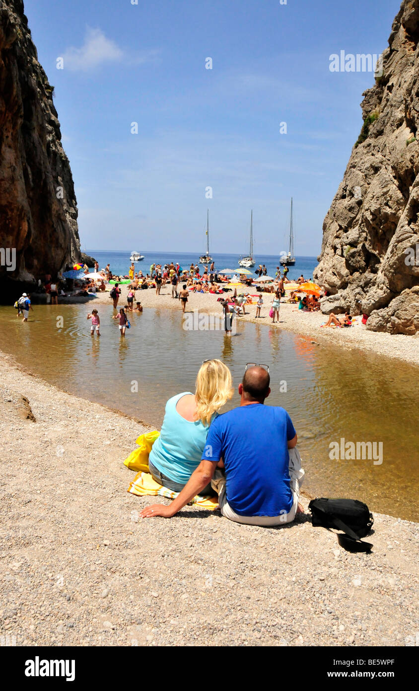 Couple on the beach Platja de Torrent de Pareis, Sa Calobra, Majorca, Balearic Islands, Spain, Europe Stock Photo