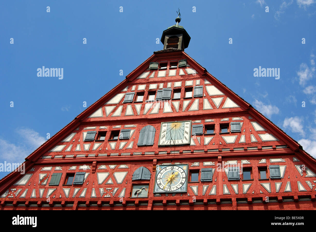 Half-timbered gable of the historial town hall of Grossbottwar with clock, sun dial and stork as heraldic animal, Grossbottwar, Stock Photo