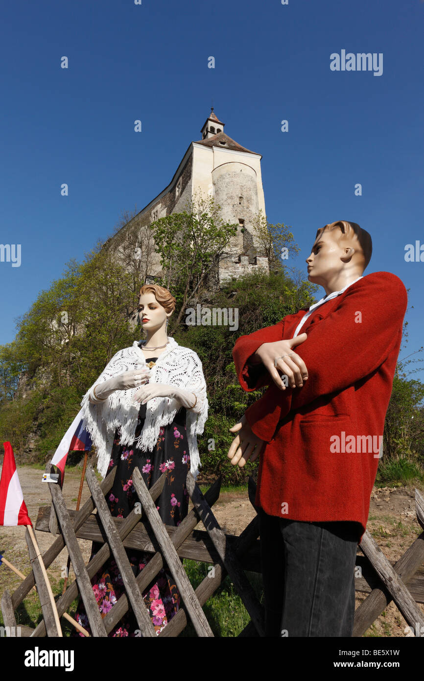 Dolls in traditional costume in front of Raabs Castle on Thaya, Waldviertel, Lower Austria, Austria, Europe Stock Photo