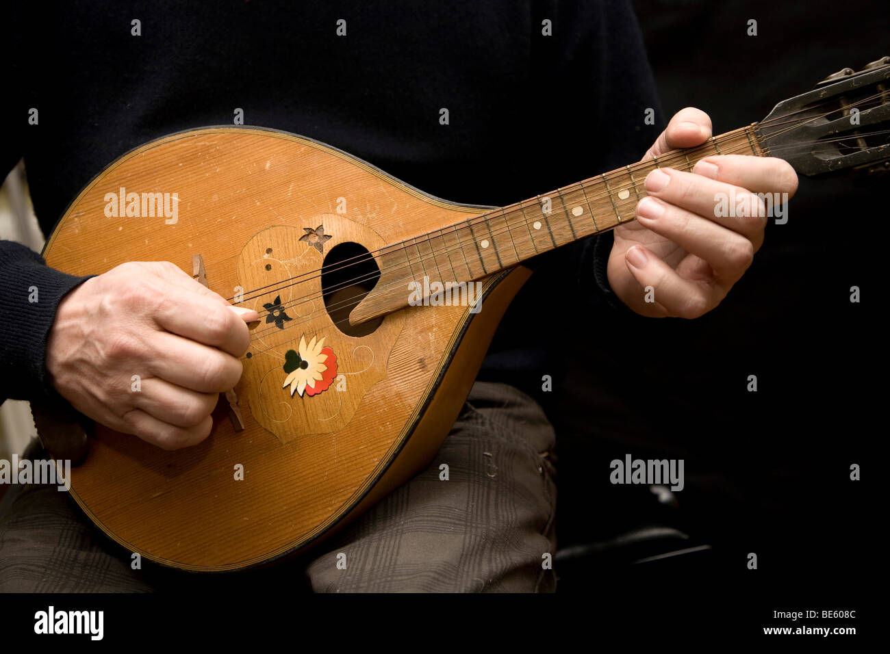 Musician playing a mandolin, detail Stock Photo