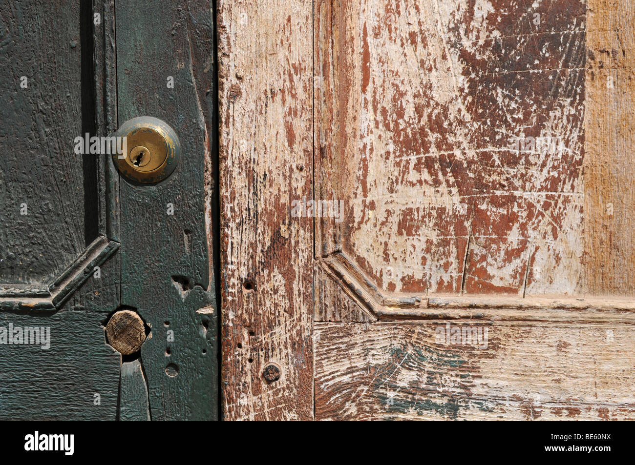 Detail of old grunge door with metal lock in Cajabamba, Peru Stock Photo