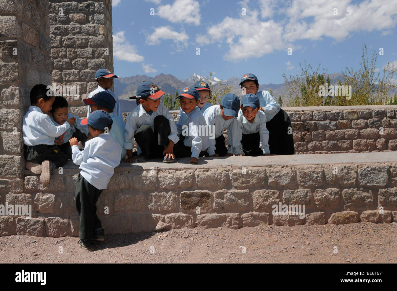 Elementary school children in the modern playground of the private-religious Druk White Lotus School, Shey, Ladakh, India, Nort Stock Photo