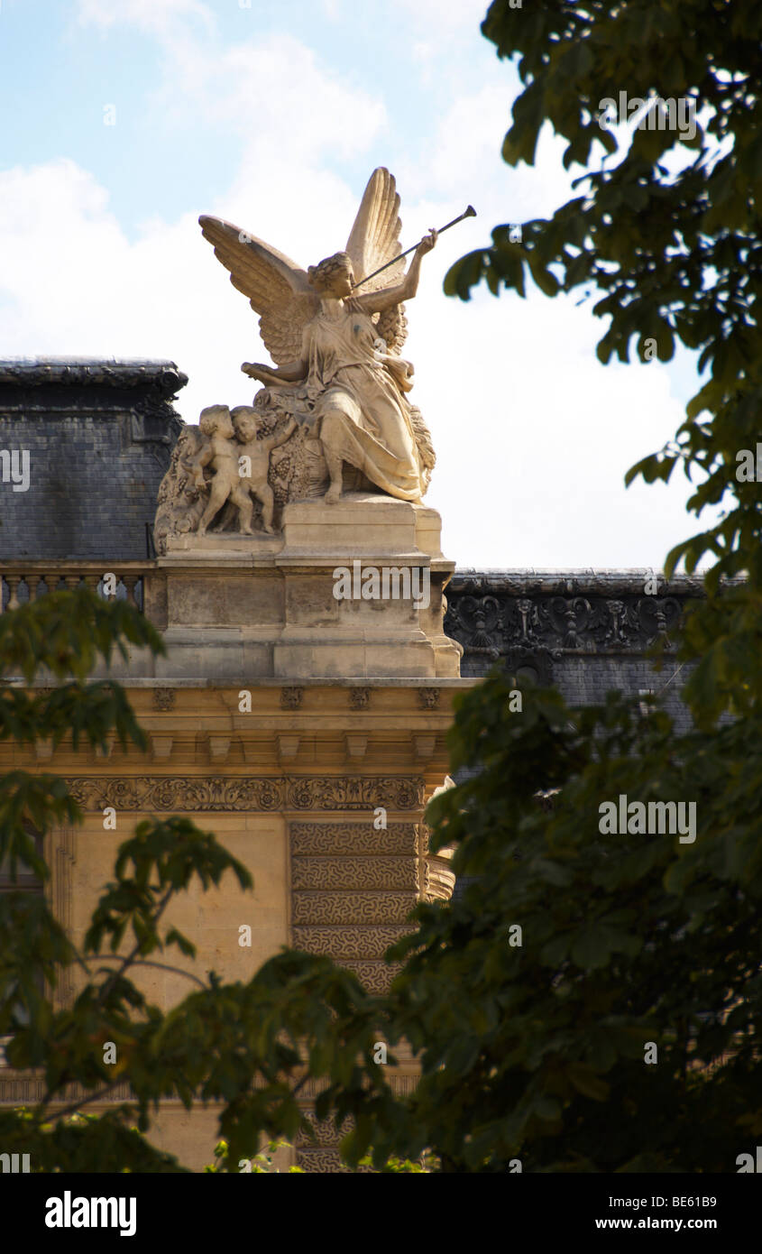 Bust of an angel playing the trumpet, on the building next to Park de Louvre, Paris, France, Europe Stock Photo